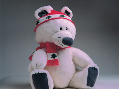 Teddy bear with red scarf