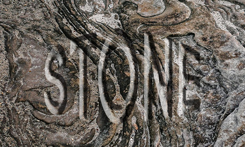 Word engraved on stone background